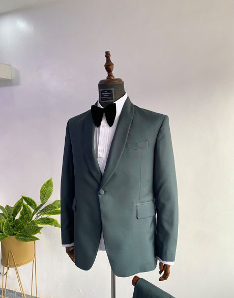 A forest green suit with a shawl lapel