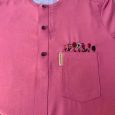 A  pink agbada set X Black rich embroidery