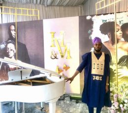 A rich blue agbada set with gold embroidery